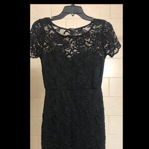 Black stretch lace dress with built in slip size Small
